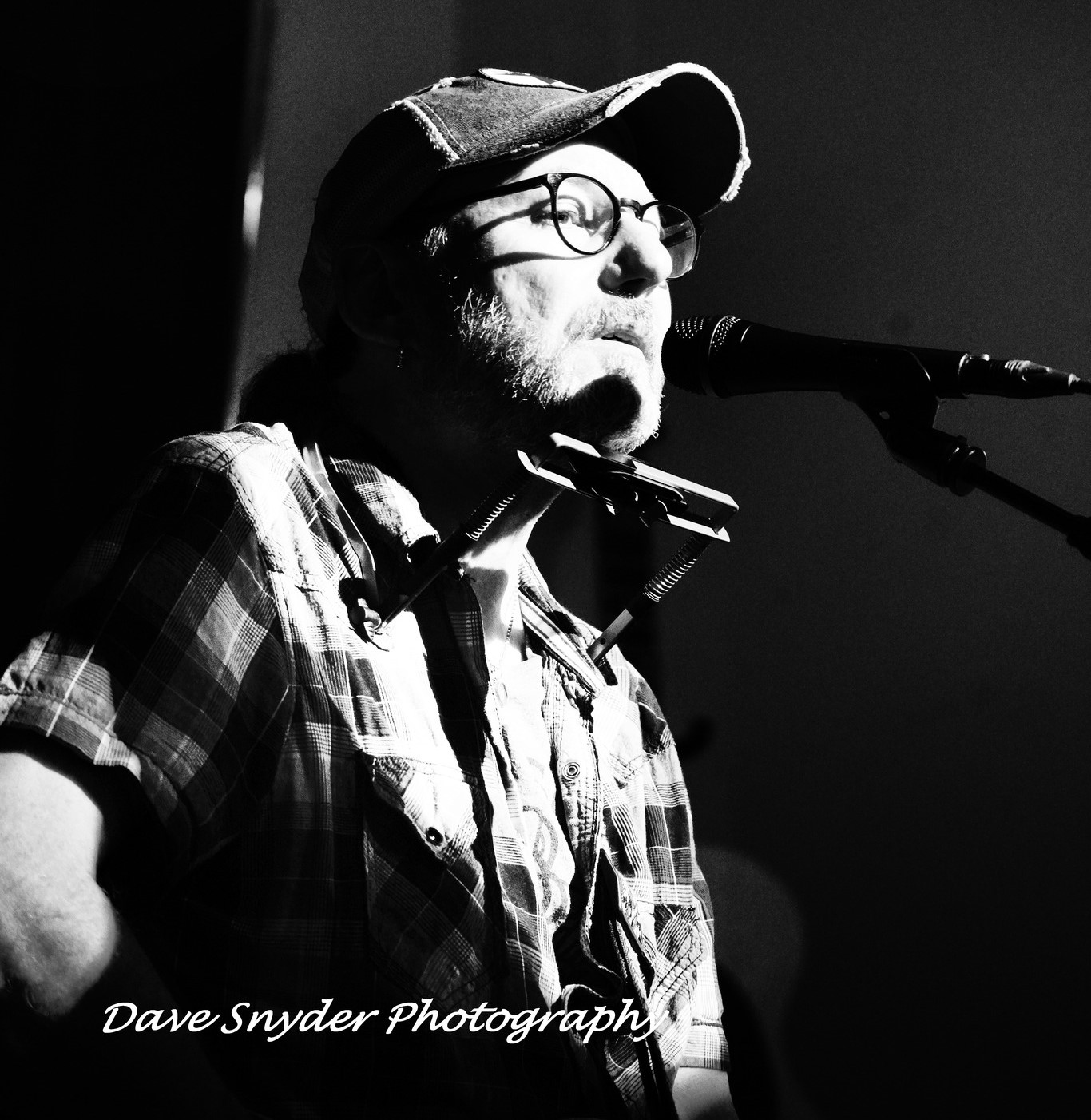 Davey O performing with a guitar