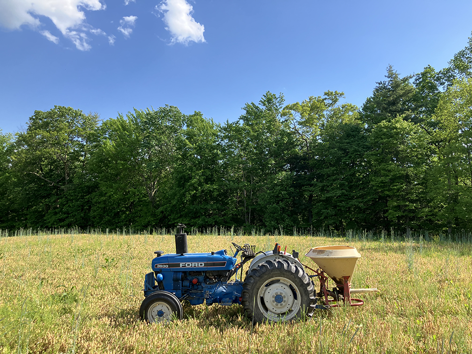 Image of another tractor in the field.