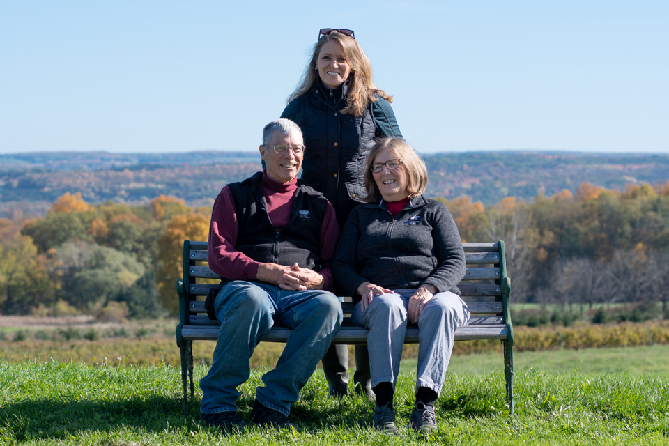 Image of Suzanne, Art and Joyce on bench.