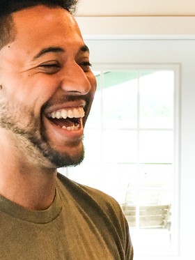 Image of Trevor Irby laughing.