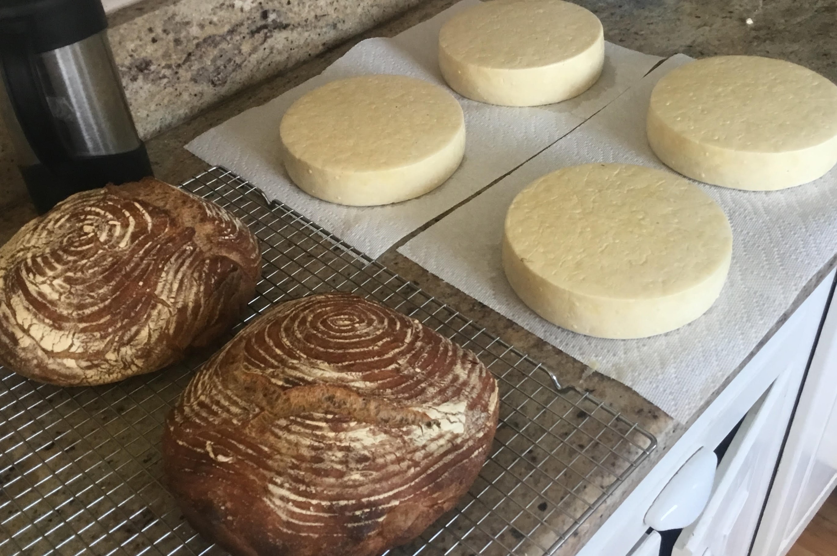 Homemade bread and cheeses